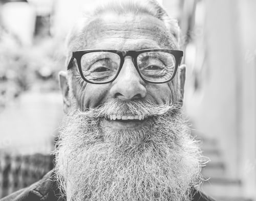 Preview: Portrait Of Middle Age Trendy Man With Serious Expression - Close Up Of Happy Bearded Senior Male
