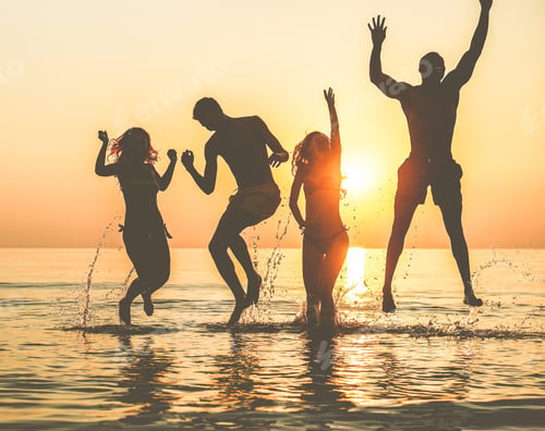 Preview: Silhouettes Of Happy Friends Jumping Inside Water On The Beach At Sunset - Group Of Young People