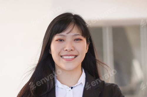 Preview: Young Woman Doing Business Video Call From Home - Asian Girl Entrepreneur In Front Of Laptop Camera