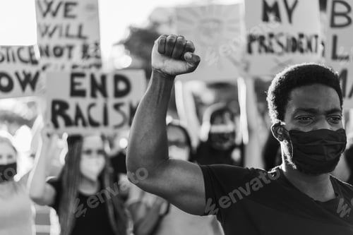 Preview: Multiracial People Wearing Face Mask During Equal Rights Protest - Focus On Black Man Eyes
