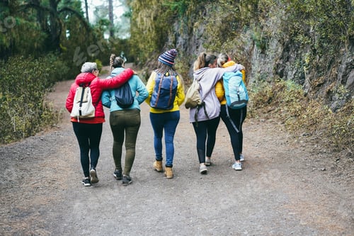 Preview: Multiracial Women Having Fun During Trekking Day In Mountain Forest - Main Focus On African Female