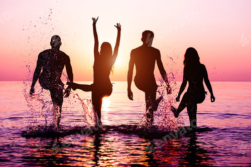 Preview: Happy Friends Splashing Water On Tropical Beach At Sunset - Group Of Young People Having Fun On