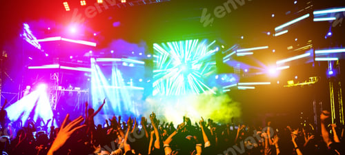 Preview: Blurred People Dancing And Having Fun In Summer Festival Party Outdoor - Crowd With Hands Up
