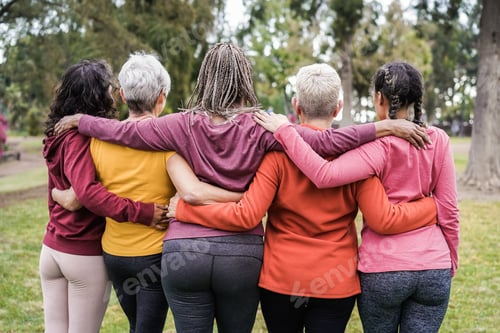 Preview: Back View Of Multi Generational Women Having Fun Together Outdoors In City Park - Main Focus On
