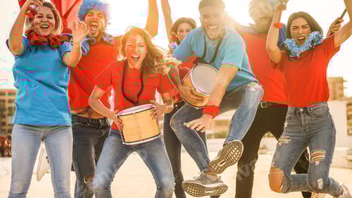 Preview: Crazy Sport Fans Playing Drums And Screaming While Supporting Their Team - Soft Focus On Left Girl