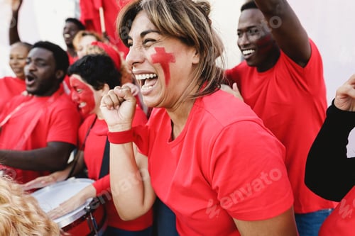 Preview: Multiracial Red Sport Fans Screaming While Supporting Their Team - Football Supporters Having Fun