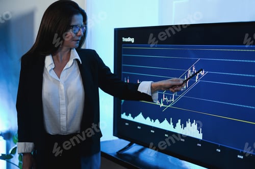 Preview: Business Woman Explaining Trading Strategies Inside Bank Meeting Room - Focus On Left Hand