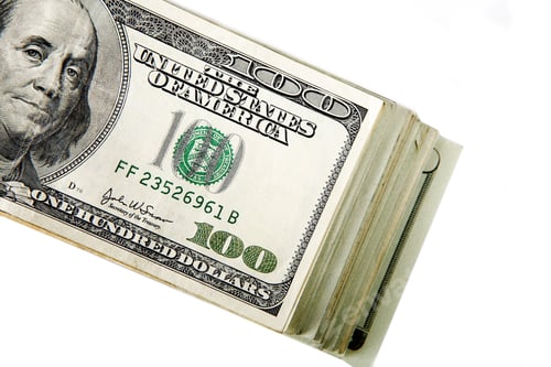 Preview: Stack of One Hundred Dollar Bills on White