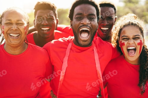 Preview: African Red Sport Fans Screaming While Supporting Their Team - Football Supporters Having Fun At