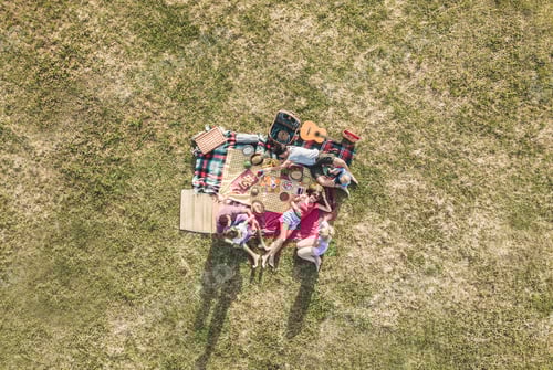 Preview: Top View Of Happy Families Doing Picnic In Park Outdoor - Young Parents Having Fun With Children In