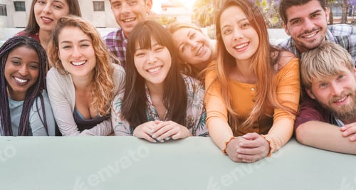 Preview: Happy Millennial Friends From Diverse Cultures And Races Having Fun Posing In Front Of Smartphone