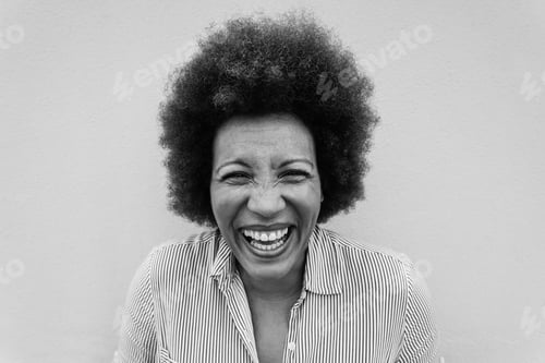 Preview: Portrait Of Happy Senior African Woman Looking At Camera - Focus On Face - Black And White Editing