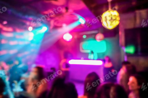Preview: Blurred People Dancing With Original Laser Blue Lights - View Of New Generation Disco Club