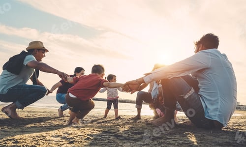Preview: Family Friends Having Fun On The Beach At Sunset - Fathers, Mothers, Children And Uncles Playing