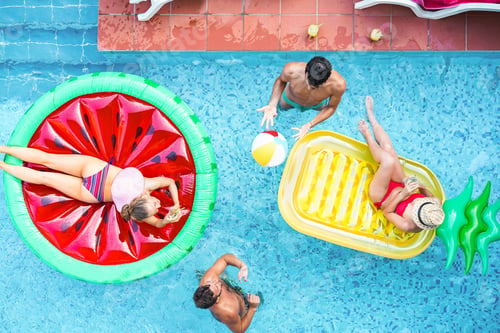 Preview: Happy Friends Playing With Air Lilo Ball Inside Swimming Pool - Young People Having Fun On Summer