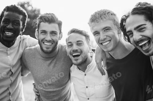 Preview: Multiracial Male Friends Having Fun Together Outdoor - Focus On Blonde Guy On Right - Black And