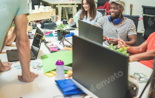Preview: Young Casually Dressed Co-Workers Planning A At Startup - Trendy Teamwork In Creative Office