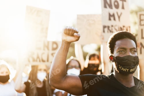 Preview: Young Black Man Wearing Face Mask During Equal Rights Protest - Concept Of Demonstrators On Road