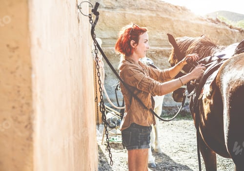 Preview: Young Cowboy Girl Preparing His Horse For A Ride - Farmer Woman Getting Ready For A Equestrian Tour