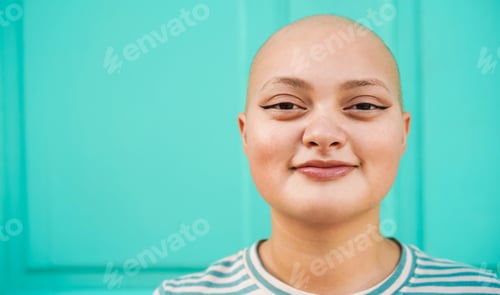 Preview: Happy Bald Girl Smiling In Front Of Camera - Focus On Mouth