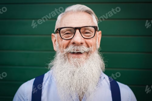 Preview: Senior Hipster Man Smiling On Camera - Main Focus On Nose