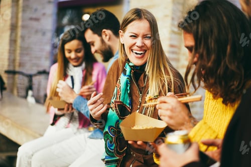Preview: Happy Young Friends Eating Takeaway Food Outdoor - Focus On Right Girl Face