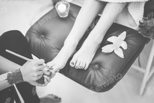 Preview: Tattoo Beauty Shop Spa Worker Painting Feet Nails To Young Woman - Female Enjoying Relaxing In Thai