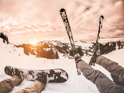 Preview: Two Friends With Snowboard An Ski Watching The Sunset On Snow High Mountains - Young Athlete Having