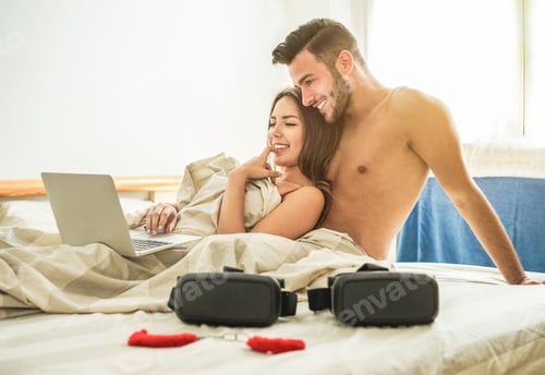 Preview: Young Couple Searching In Internet New Ideas For Sex In Bedroom - Two Lovers Using New Vr