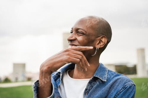 Preview: Gay African Man Having Fun Outdoor - Focus On Eye