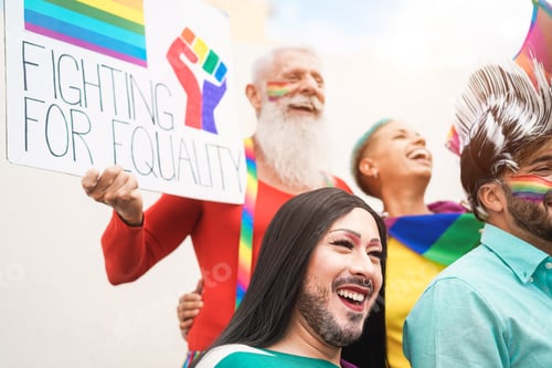 Preview: Group Of People With Rainbow Flags And Banners Having Fun During Gay Pride Event - Lgbt Concept