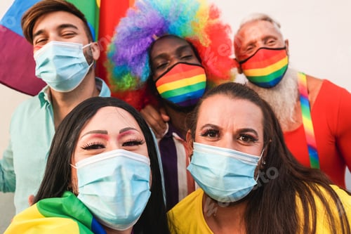 Preview: Group Of Friends Enjoying The Lgbt Parade Taking A Selfie During Coronavirus Outbreak - Focus On