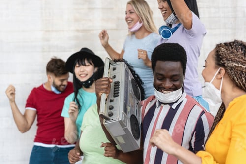 Preview: Happy People From Different Races Dancing Outdoor While Listening Music From Old Boombox Stereo