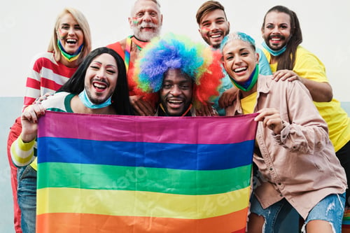 Preview: Gay People Dance At Pride Parade With Lgbt Flags While Wearing Protective Face Mask - Main Focus On