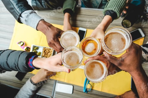 Preview: Group Of Friends Enjoying A Beer Glasses In English Pub Restaurant - Young People Cheering At
