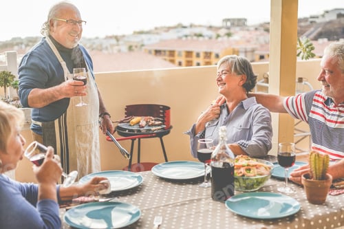 Preview: Happy Senior Friends Having Fun At Barbecue Dinner In Patio Outdoor - Mature Old People Dining And