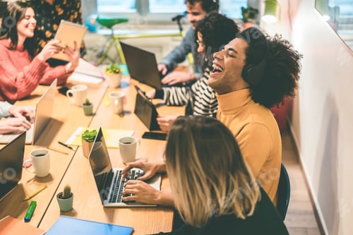 Preview: Young Multiracial People Having Fun Working Inside Coworking Office - Soft Focus African Man Face