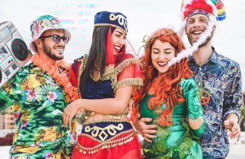 Preview: Happy Dressed People Celebrating At Carnival Party Throwing Confetti - Young Friends Having Fun