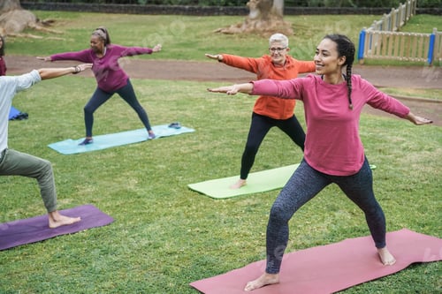 Preview: Multi Generational People Doing Yoga Class At City Park - Focus On African Girl Face