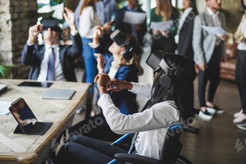 Preview: Diverse Business People Wearing Virtual Reality Goggles Inside Office - Focus On African Girl