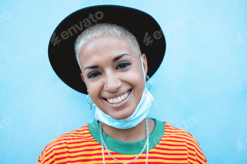 Preview: Mixed Race Smiling On Camera Wearing Face Protective Mask During Coronavirus Outbreak