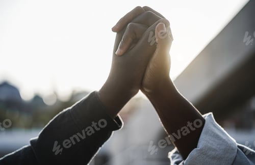 Preview: Black People Holding Hands During Protest For No Racism