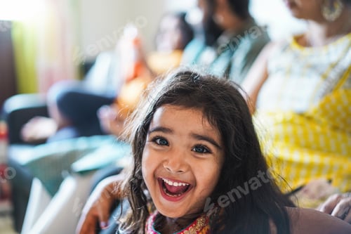 Preview: Happy Indian Toddler Wearing Sari Dress At Home With Her Family - Focus On Girl Face