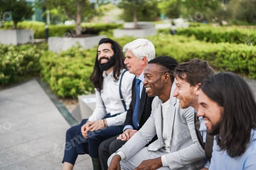 Preview: Multiethnic Business Men Having Fun Outside Of The Office - Focus On African Man Hand