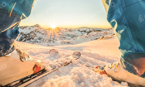 Preview: Skier Athlete Standing In Front Of Wonderful Sunset In Ski Resort - Winter Extreme Sport Concept