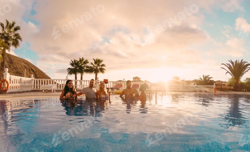 Preview: Happy Friends Drinking Champagne In Pool Party At Sunset - Rich People Having Fun In Exclusive
