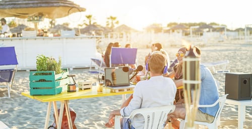 Preview: Group Of Young People Making A Video Live Streaming From Beach Party At Sunset - New Technology