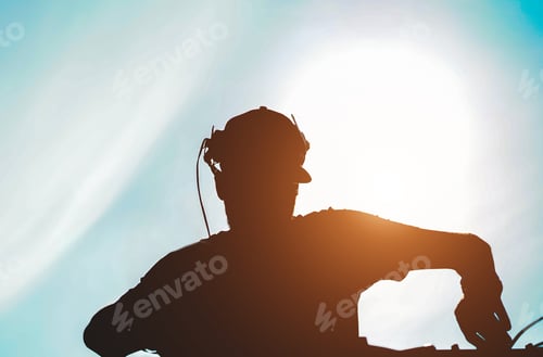 Preview: Silhouette Of Dj Mixing Outdoor With Back Sun Light - Portrait Of Disc Jockey Playing Old Style
