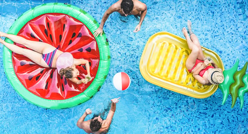 Preview: Happy Friends Playing With Air Lilo Ball Inside Swimming Pool - Young People Having Fun On Summer