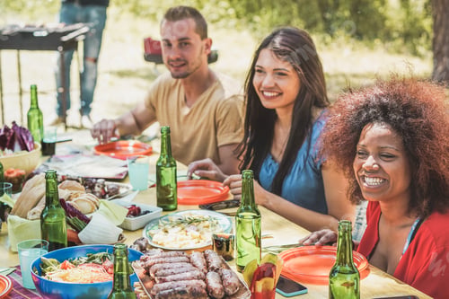 Preview: Group Of Happy People Laughing At Picnic Bbq Lunch In Nature - Young Friends Having Fun At Barbecue